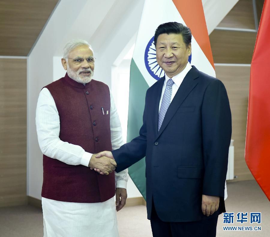 7月8日，国家主席习近平在俄罗斯乌法会见印度总理莫迪。新华社记者张铎摄