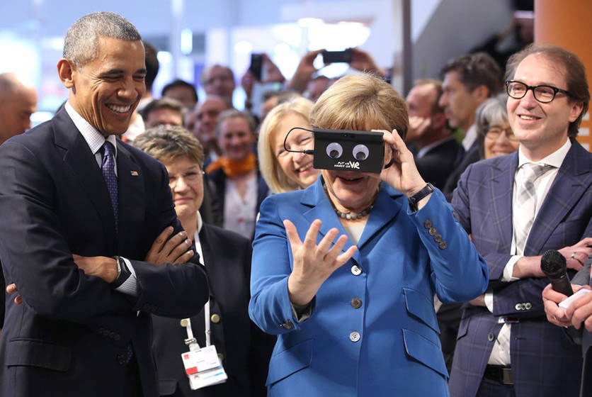 奧巴馬和默克爾體驗虛擬現實眼鏡 二人變身大眼萌