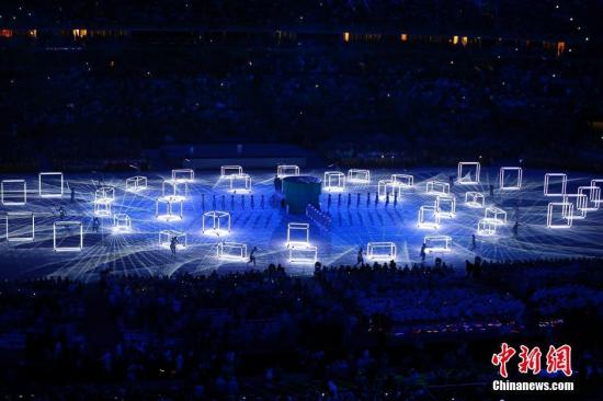 当地时间8月21日，2016里约奥运会闭幕式在马拉卡纳体育场内举行。图为现场展示出东京奥运会会徽、富士山等形象，以“SeeyouinTokyo!”结束表演。中新网</a><p align=