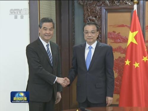 李克强会见来京述职的梁振英和崔世安