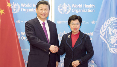 习近平访问世界卫生组织并会见陈冯富珍总干事