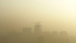 北京再现半城雾霾半城蓝天现象 专家详解成因