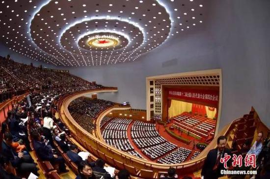 资料图:2016年3月5日,十二届全国人民代表大会四次会议在人民大会堂举行开幕会。中新社记者 金硕 摄