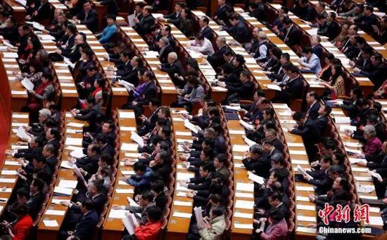 资料图:2016年3月10日,全国政协十二届四次会议在北京人民大会堂举行第二次全体会议。 中新社记者 汤彦俊 摄