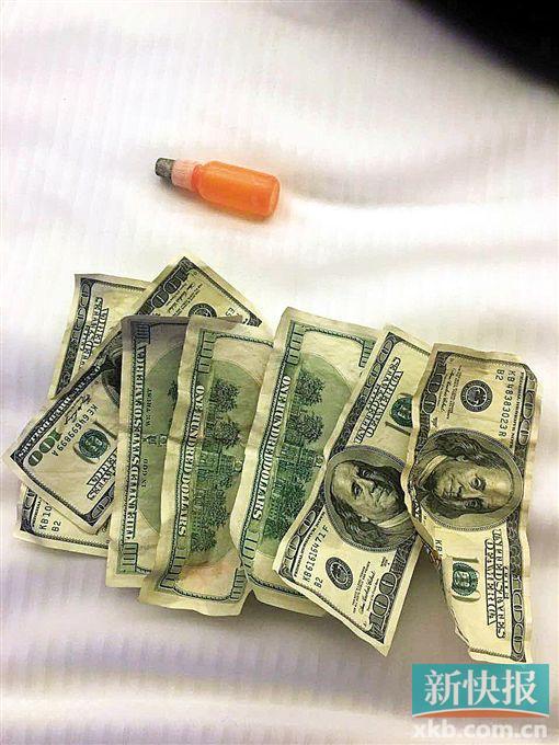 女子眼见黑纸用药水洗成美钞 随后交425万学费