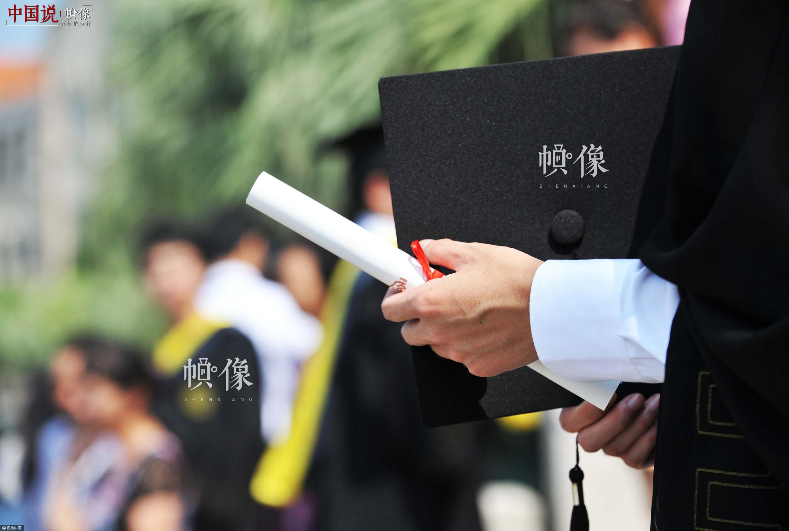 2011年6月26日，福建廈門，廈門大學舉行2011屆畢業生畢業典禮。視覺中國供圖