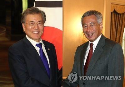 资料图片：韩国总统文在寅（左）与新加坡总理李显龙（图片来源：韩联社）