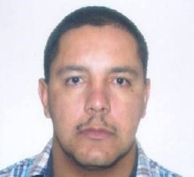 资料图片：图为通缉令上的大毒枭胡安·卡洛斯·梅萨的照片。（图片来源于网络）
