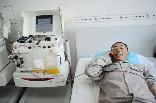 Guo Mingyi has donated 60 liters of blood over the past two decades.