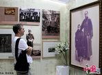 معرض متعلقات شخصية لرائد الثورة الديمقراطية الصينية يفتتح ببكين 