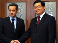 Le président chinois rencontre son homologue français