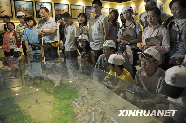 Le 21 juillet, des touristes taiwanais se rendent au Musée du Xinjiang