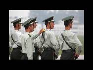 Le 5 septembre, des militaires participent à un entrainement sur un aéroport militaire de l'Armée Populaire de Libération, situé à Beijing. 