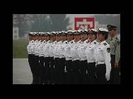 Le 5 septembre, des militaires participent à un entrainement sur un aéroport militaire de l'Armée Populaire de Libération, situé à Beijing. 