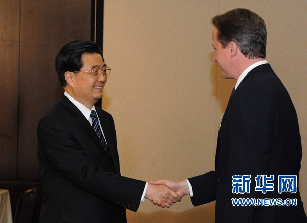 Entretien entre le président chinois et le PM britannique à Toronto