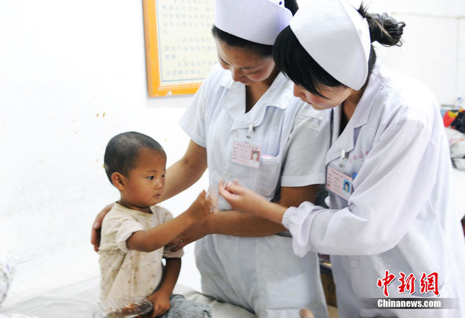 Les secours s'organisent après les coulées de boue de Zhouqu 