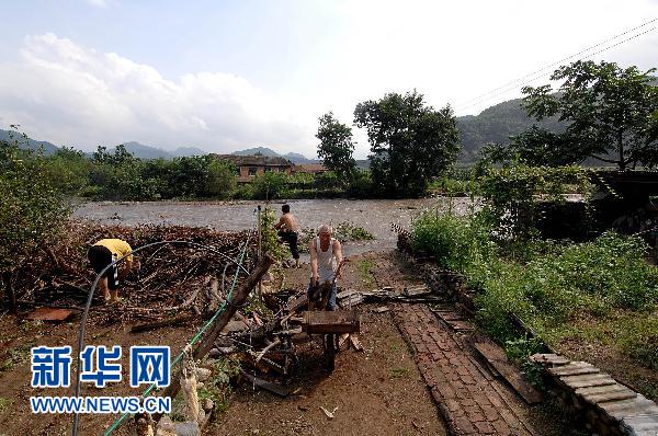 L'autorité chinoise de contrôle des inondations appelle à redoubler d'efforts pour contenir les inondations de la rivière Yalu