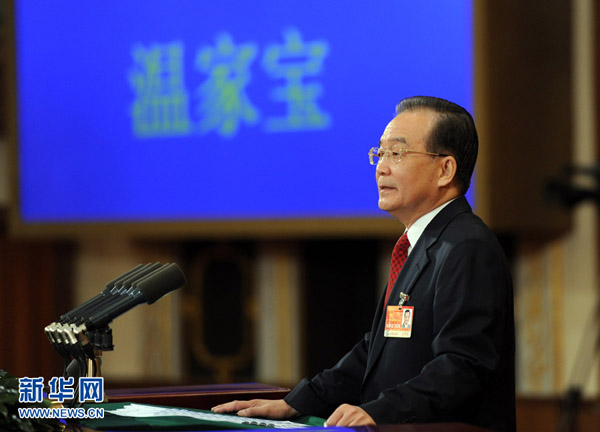 Le Premier ministre chinois Wen Jiabao présente un rapport d&apos;activité du gouvernement.