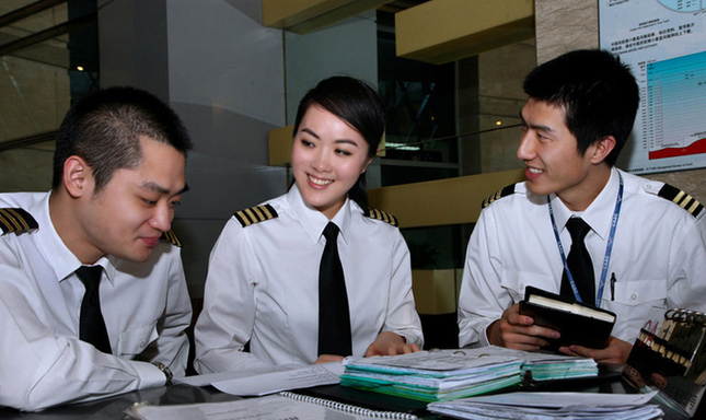 Wang Zheng, la seule femme capitaine volant sur Air China, et la plus jeune pilote de l&apos;Administration de l&apos;aviation civile de Chine.