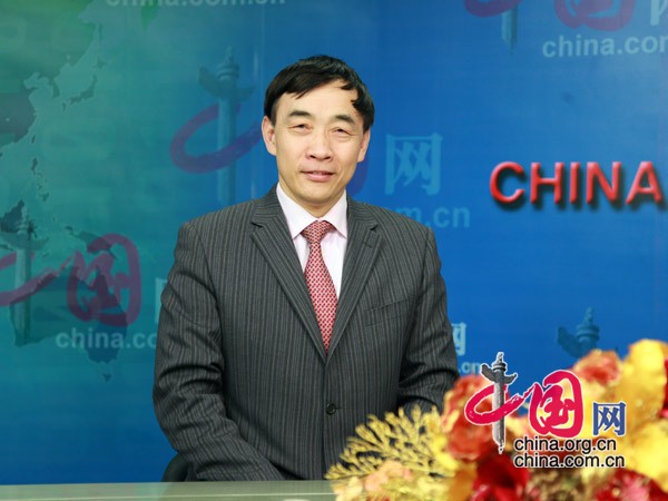 Le 22 février, Qu Xing, directeur de l'Institut des études internationales de Chine, accorde une interview à China.org.cn.