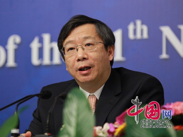 Yi Gang, vice-gouverneur de la Banque populaire de Chine et président de l'Administration nationale des Devises