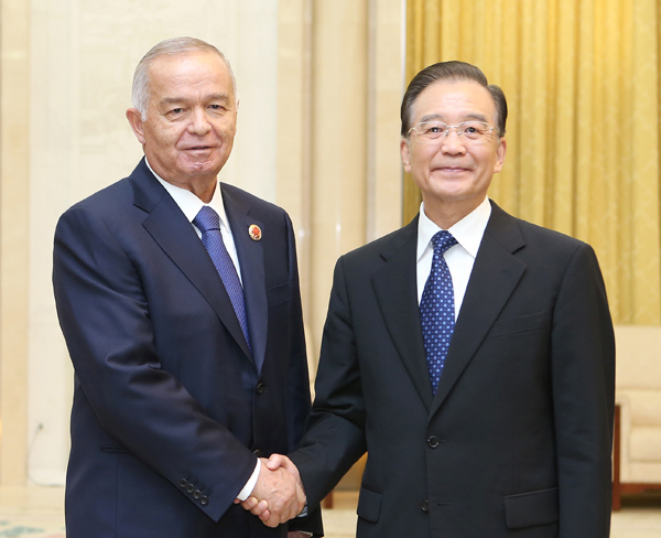 Le Premier ministre chinois rencontre le président ouzbek