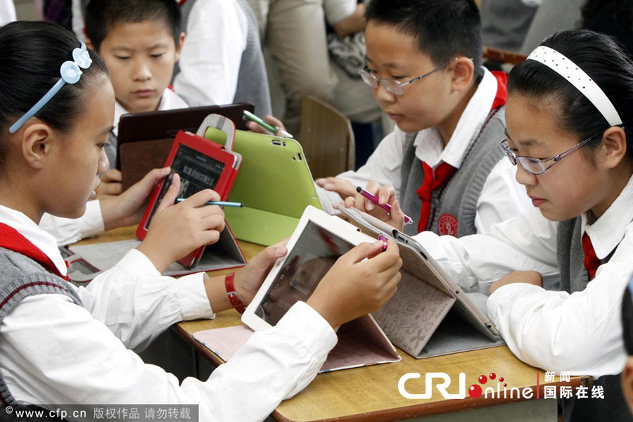 Distribution d&apos;iPad à des écoliers à Nanjing
