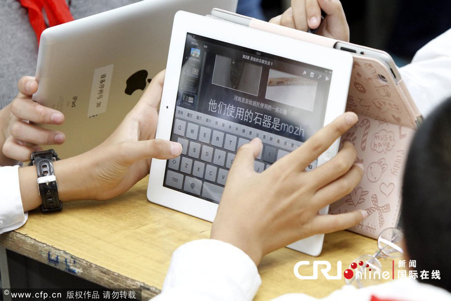 Distribution d&apos;iPad à des écoliers à Nanjing