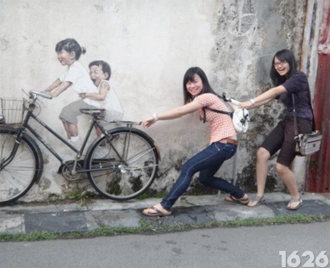 Photographie d'un graffiti sur la bicyclette en Malaisie 1