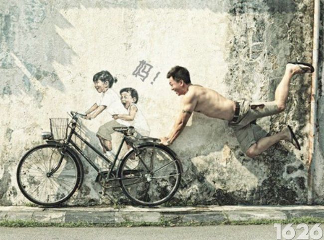 Photographie d'un graffiti sur la bicyclette en Malaisie 2