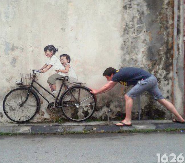 Photographie d'un graffiti sur la bicyclette en Malaisie 4