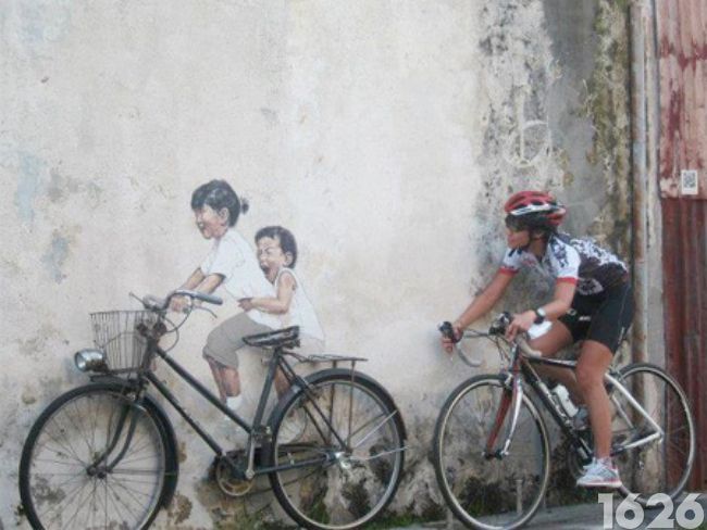 Photographie d'un graffiti sur la bicyclette en Malaisie 5