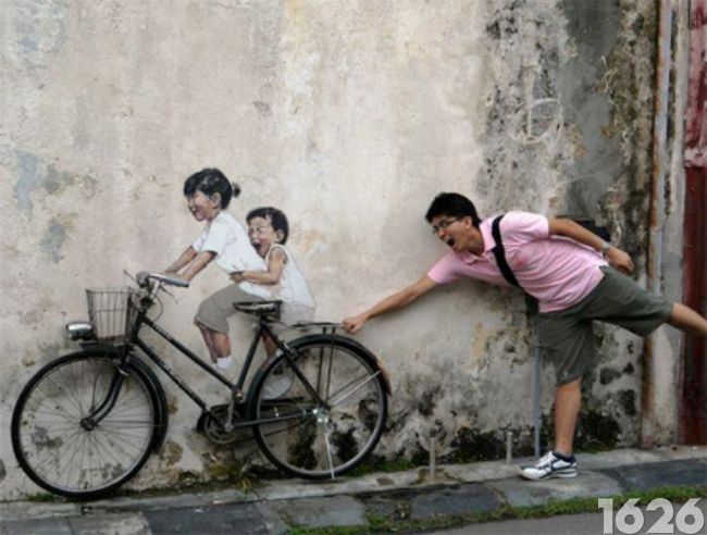 Photographie d'un graffiti sur la bicyclette en Malaisie 8