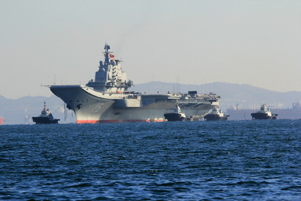 Le porte-avions chinois retourne fièrement au port