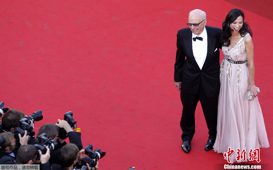 En images : le parcours de Murdoch et Wendi Deng