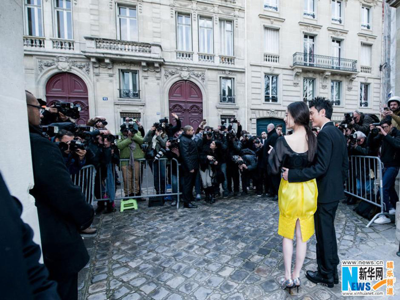 Le couple Ni Ni - Feng Shaofeng au défilé Dior à Paris