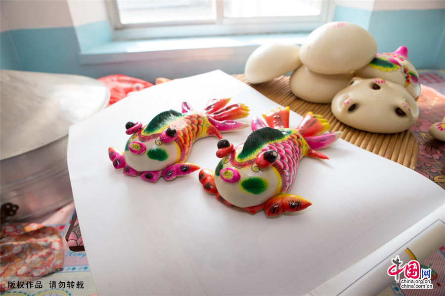 Les habitants de Wenxi réalisent des pains colorés de plus de 200 formes différentes, faisant de cette technique culinaire une forme d'art complète. 