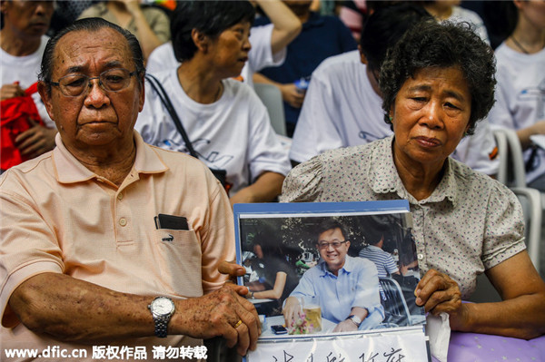 MH370 families remember one year on