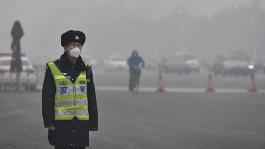 Toujours en alerte orange à la pollution ce mardi, Beijing retient son souffle