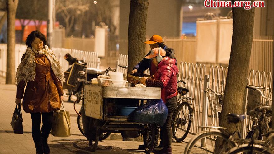 Instantanés de la vie à Beijing juste avant le lever du jour