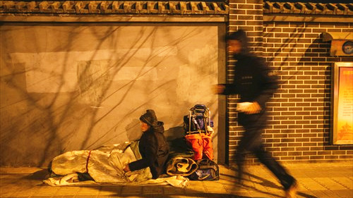 Les sans-abri de Beijing tentent de survivre par des températures inférieures à zéro