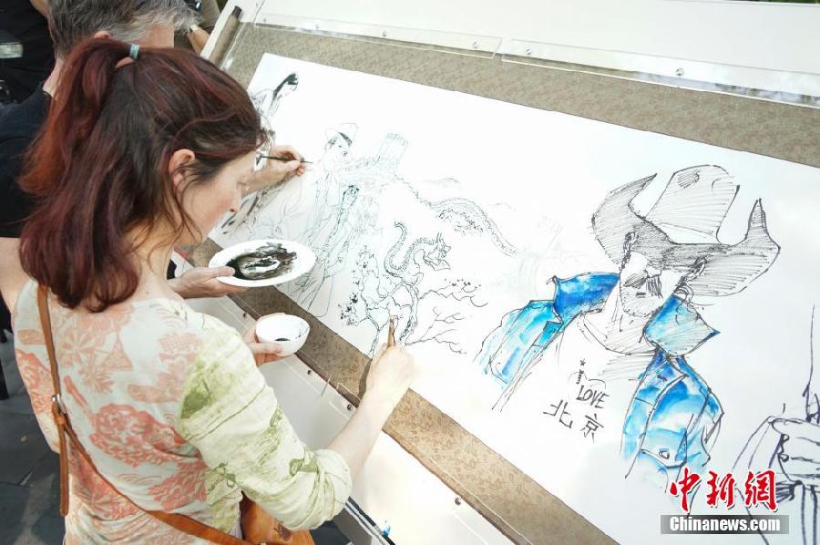 Dix artistes étrangers improvisent un dessin sur la ville de Beijing