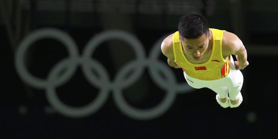 Le Chinois Dong Dong lors de la finale de trampoline masculin à Rio de Janeiro, au Brésil, le 13 août 2016. [Photo Wei Xiaohao / chinadaily.com.cn]