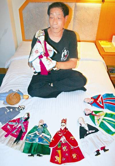 7 Finger, Handfl?chen ,Leben, Puppe ,Mann ,traditionelle chinesische Handpuppenspiel ,Techniken wie Schnitzerei, Malerei und Stickerei ,Volksmusik,Kultur, Geschichte und Stickkunst,Lebensunterhalt,Taiwan,Langen Marsch,Soldat