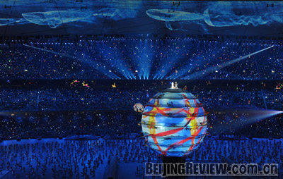 1 Das Olympia-Titellied von Beijing gesungen von Sarah Brightman und Liu Huan und komponiert von Chen Qigang beschw?rt Einfachheit, Reinheit und Frieden.
