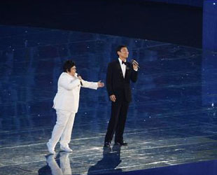 Han Hong und Andy Lau singen die paralympische Hymne 'Fliegen mit einem Traum'