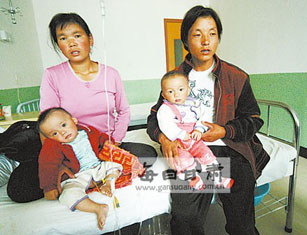 14 Babies mussten mit Nierensteinen in Gansu ins Krankenhaus. Ihre Eltern vermuten, dass die Milchpulvermarke 'Sanlu“ für die Krankheit verantwortlich sei. Der Produzent bestreitet dies jedoch.