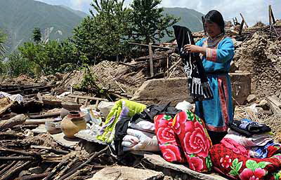 2 Die Qiang befinden sich in den am st?rksten von dem Sichuan-Erdbeben betroffenen Gebieten und ihre Kultur war daher schwer besch?digt.