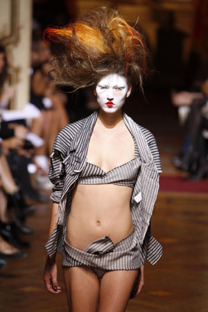 A model presents a creation by British fashion designer Vivienne Westwood as part of her Spring/Summer 2010 collection during Paris Fashion Week October 2, 2009.