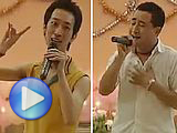 Chen Weisi und Luo Xu, zwei Mitarbeiter der Fremdsprachenabteilung singen Lieder bei der Feier von China.org.cn zum Frühlingsfest 2005.
